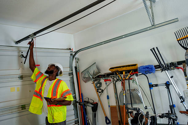 Professional Garage Door Panel Replacement technician working in Manchester, IA